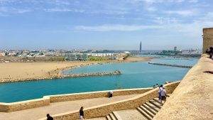 Panoramic view of the Rabat Corniche overlooking the Bouregreg Marina, the Bouregreg River, Kasbah of the Udayas, and the Atlantic coastline at sunset in Rabat, Morocco