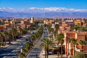 City center of Ouarzazate Morocco with palm-lined boulevard