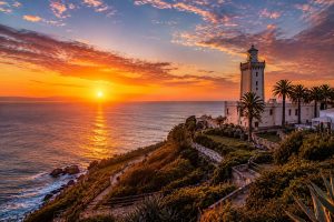 Golden sunset over Cap Spartel in Tangier, where the Atlantic Ocean meets the Mediterranean Sea, northern Morocco