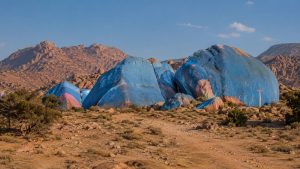 Painted Rocks of Tafraoute surrounded by pink granite mountains in Morocco’s Anti-Atlas
